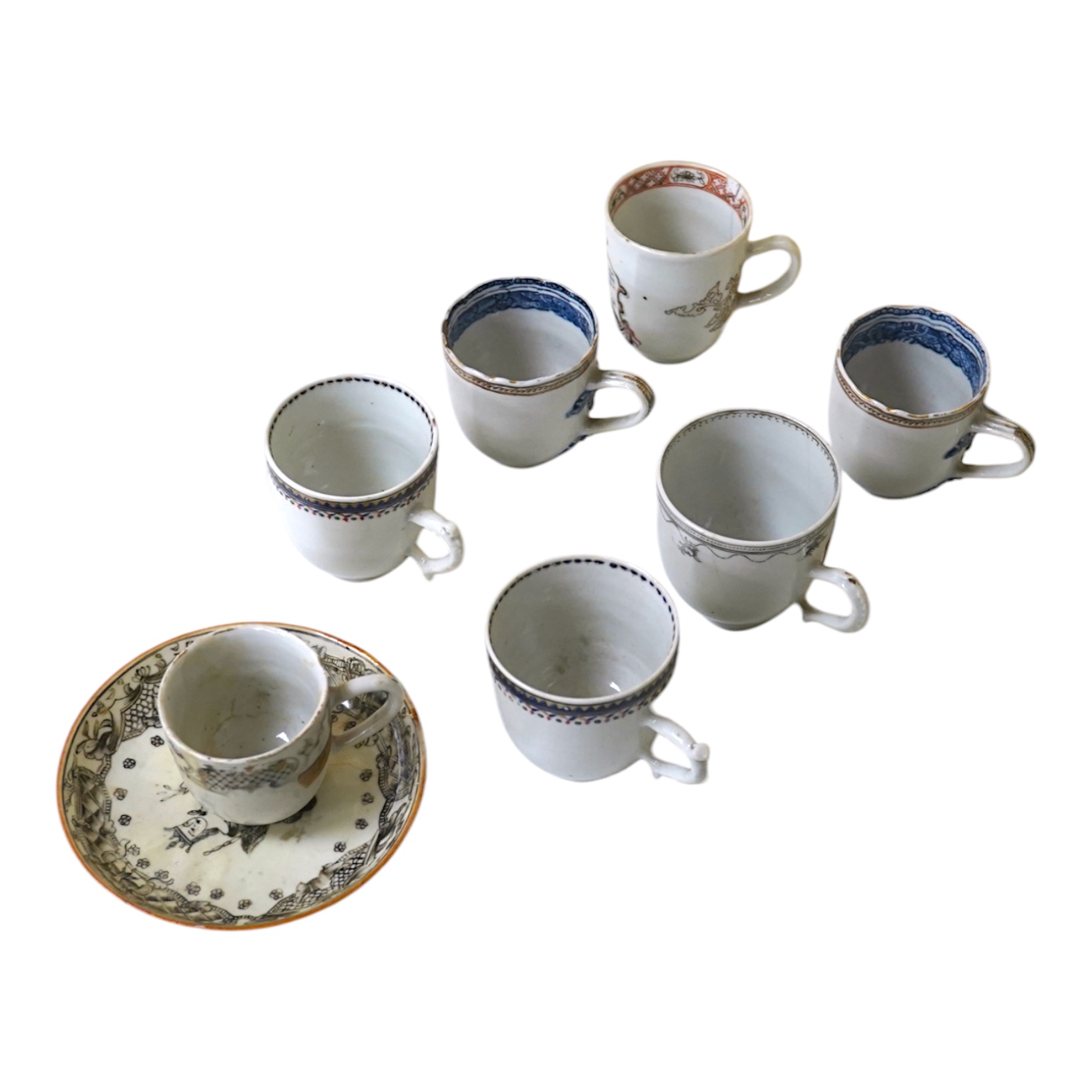 Six assorted 18th century Chinese export coffee cups with armorial decoration, and a similar European subject cup and saucer. Condition - damaged/restored